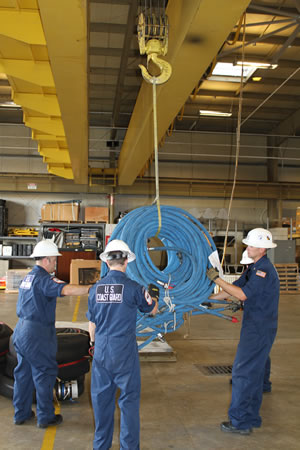 GST members develop a training curriculum for equipment pallet load-out on CG new medium endurance aircraft